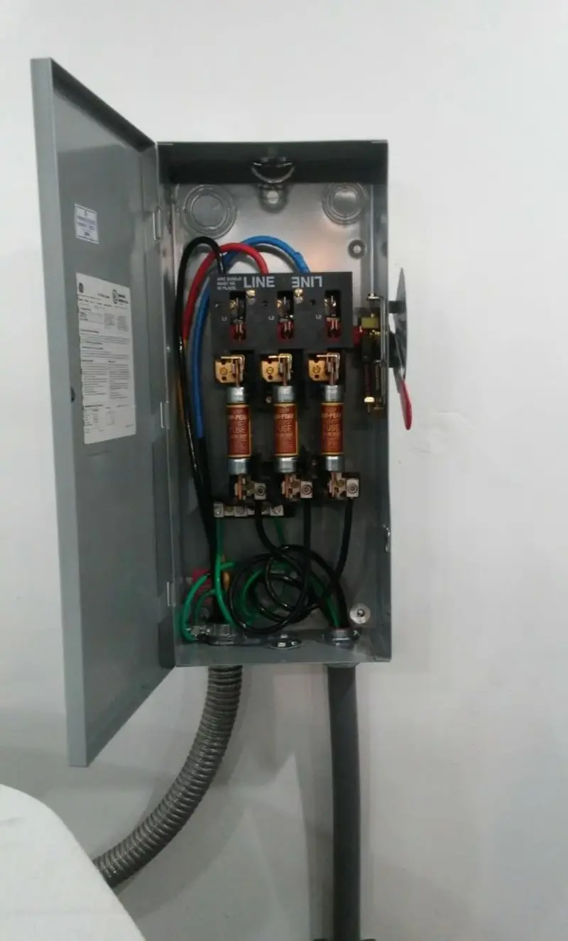 Three-phase disconnect switch installed for Smoke Detector Installation in Hunters Creek